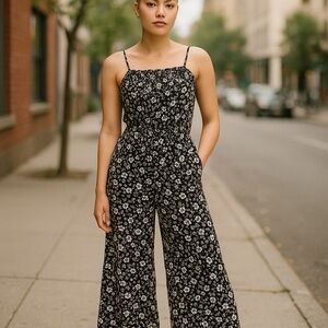 Maurices Black and White Floral Jumpsuit Romper with Wide-Leg Design adjustable